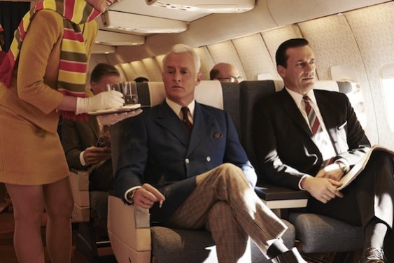 Something's bothering Roger Sterling about how his wine tastes on the flight.