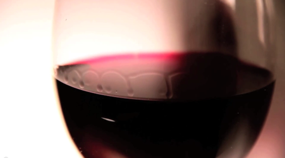 Wine legs are actually caused by surface tension. Image credit: Dan Quinn/YouTube.