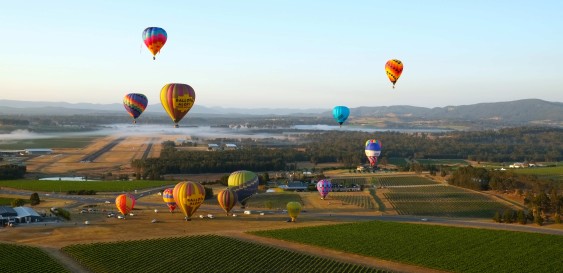 If you get to the Hunter Valley, book a sunrise hot-air balloon ride with Balloon Aloft.