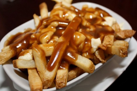 Look no further than Canada's wine regions for a wine to pair with poutine. Photo source: Bakesforbreastcancer.