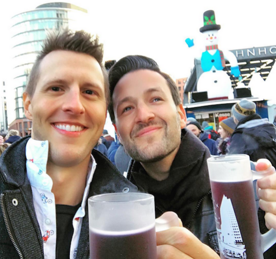 Glühwein in hand, my friend and I get into the festive spirit at a Christmas market in Berlin.